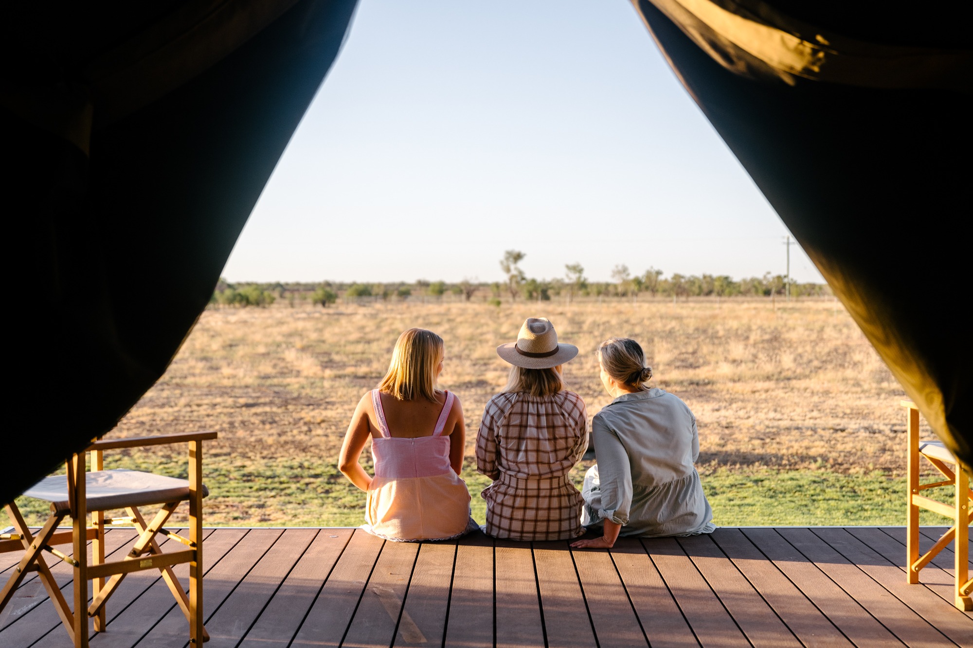 The women glamping and relaxing at Mitchell Grass Retreat.
